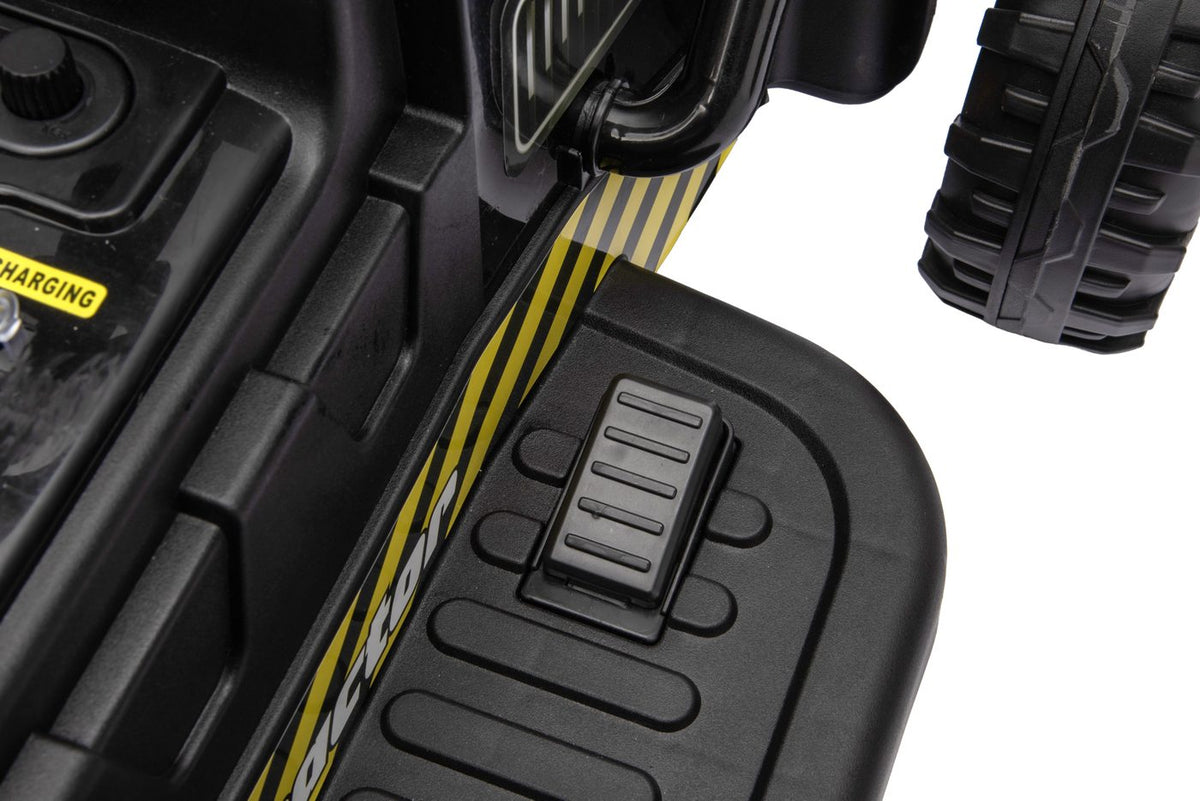 Close-up of the foot pedal on the tractor floorboard