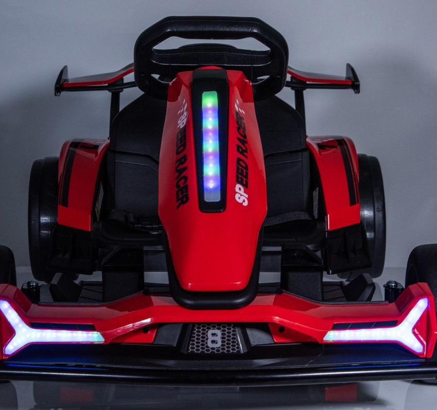 Front view of the kart with its LED headlights and nose light bar switched on