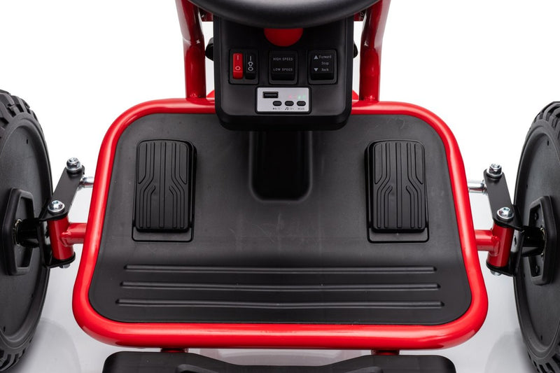 The footwell with two pedals on a wide footrest