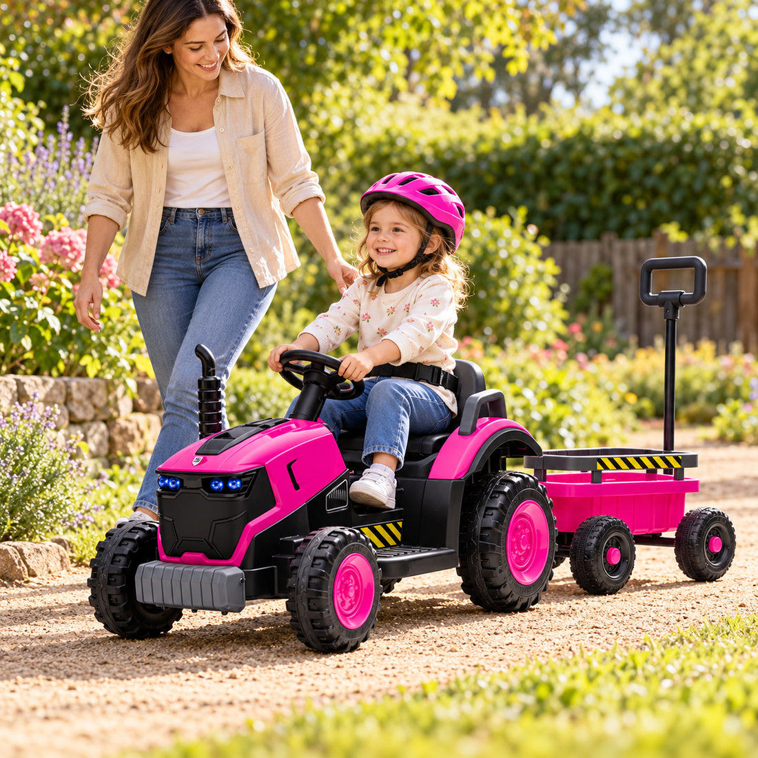 FB319 ride-on tractor in Rose – parent and child playing together outdoors