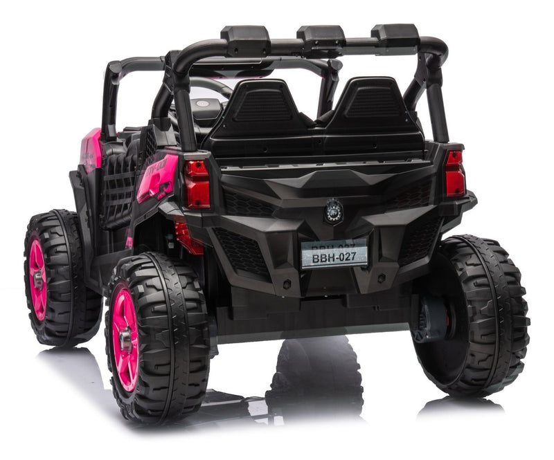 Rear three-quarter view of the pink UTV