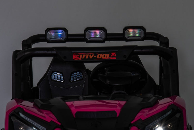 The three roof lights glowing above the seats