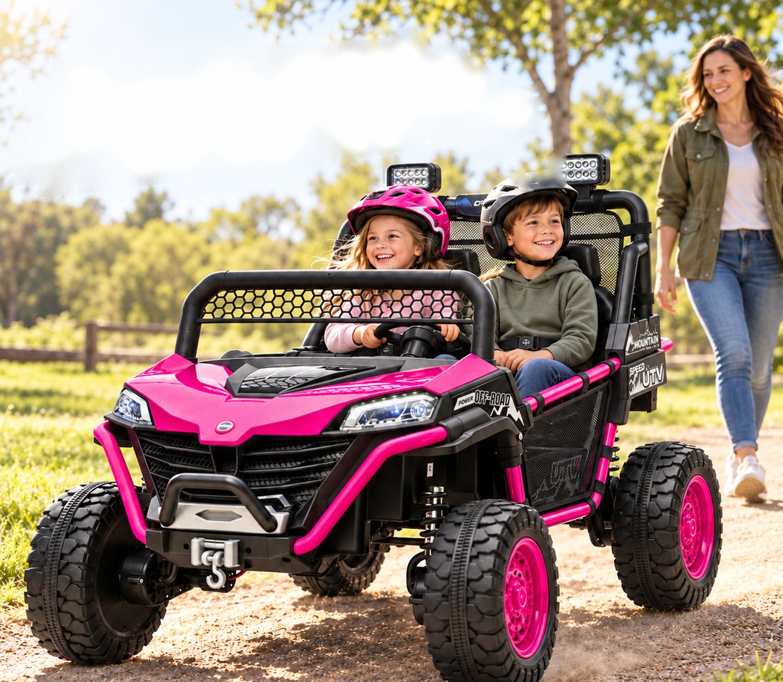 A girl and a boy in helmets ride side by side in the rose UTV down a dirt path while their mom walks behind