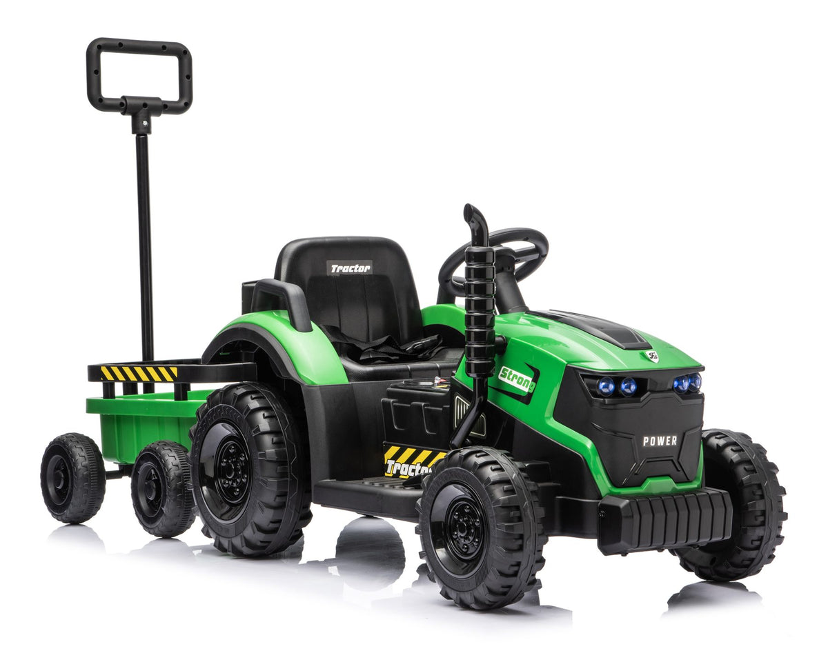 The green ride-on tractor with trailer, front right view