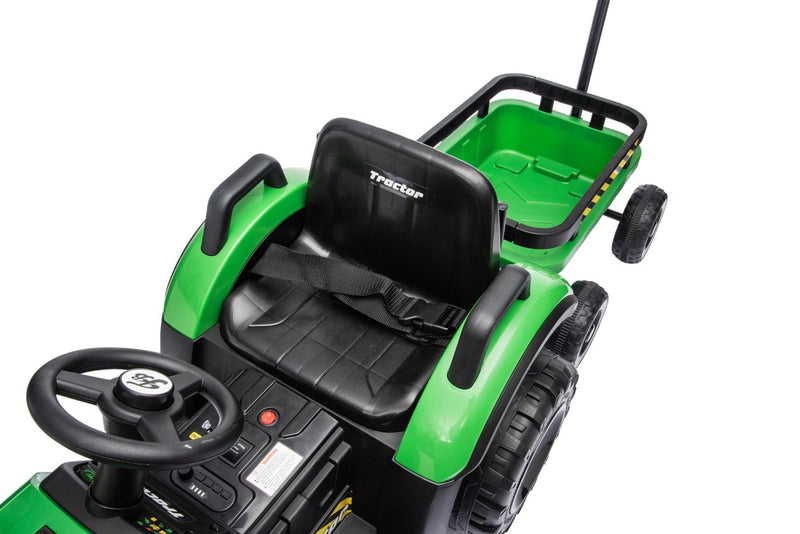 The molded single seat with lap belt, steering wheel and trailer behind