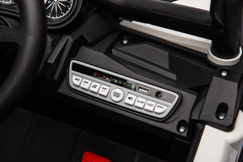 The music panel with play, volume, start / stop, light and slow / fast buttons plus a USB port
