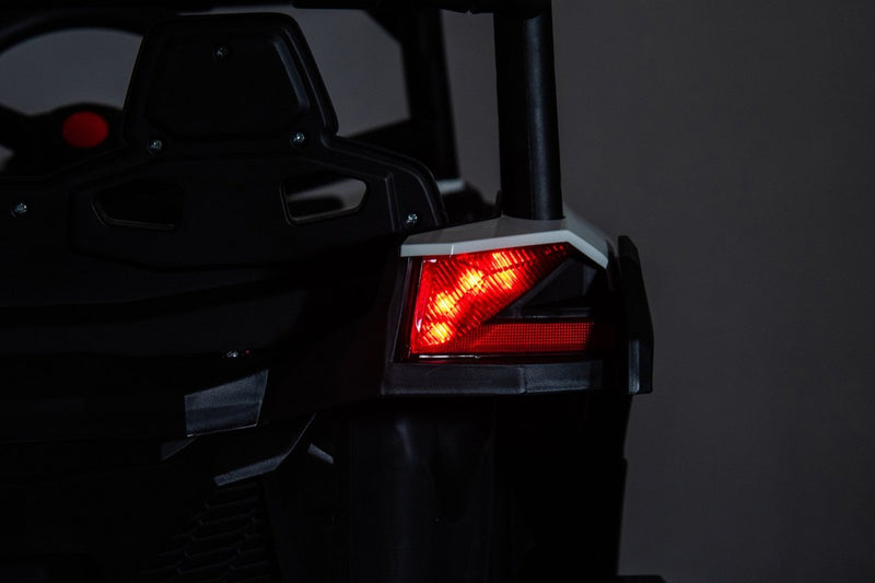 The red LED tail light glowing at the back