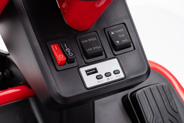 The control panel with power switch, high / low speed, forward / reverse and USB music buttons