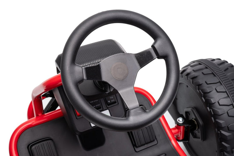 The black three-spoke steering wheel